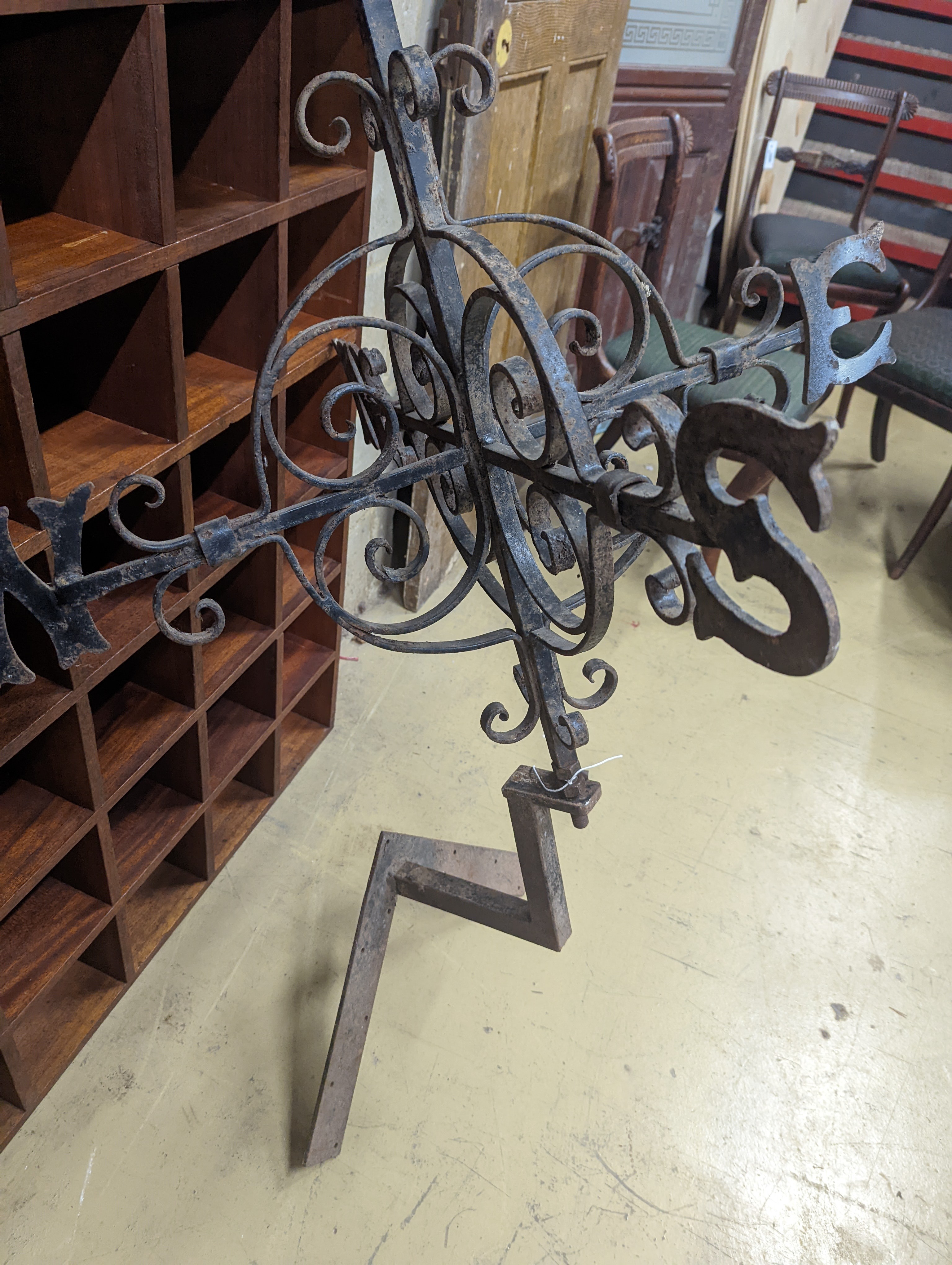 A wrought iron weather vane, width 90cm
